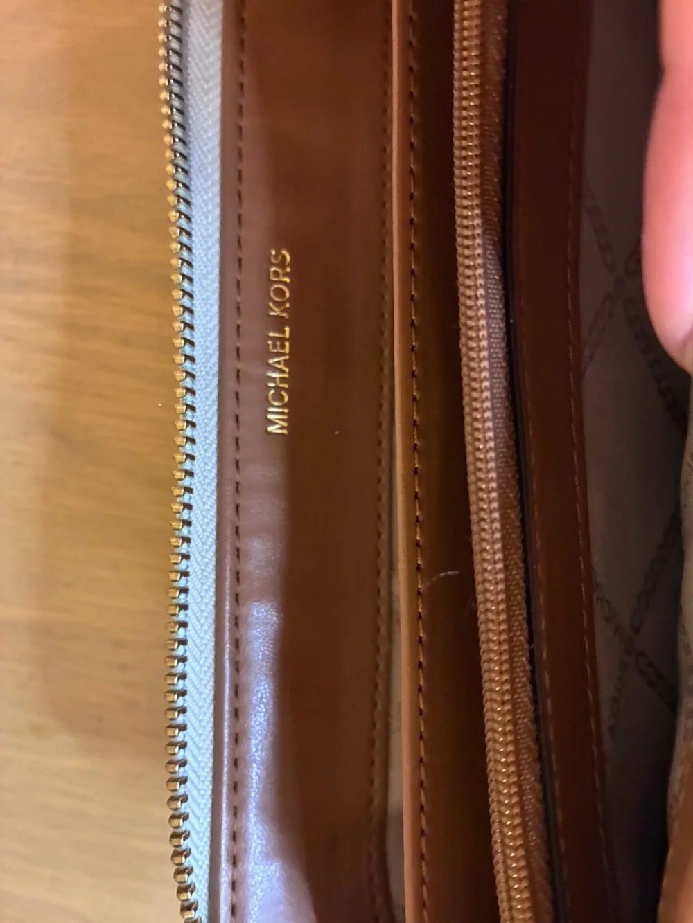 Michael Kors Silver Metallic Logo Zip Wristlet with Brown Strap